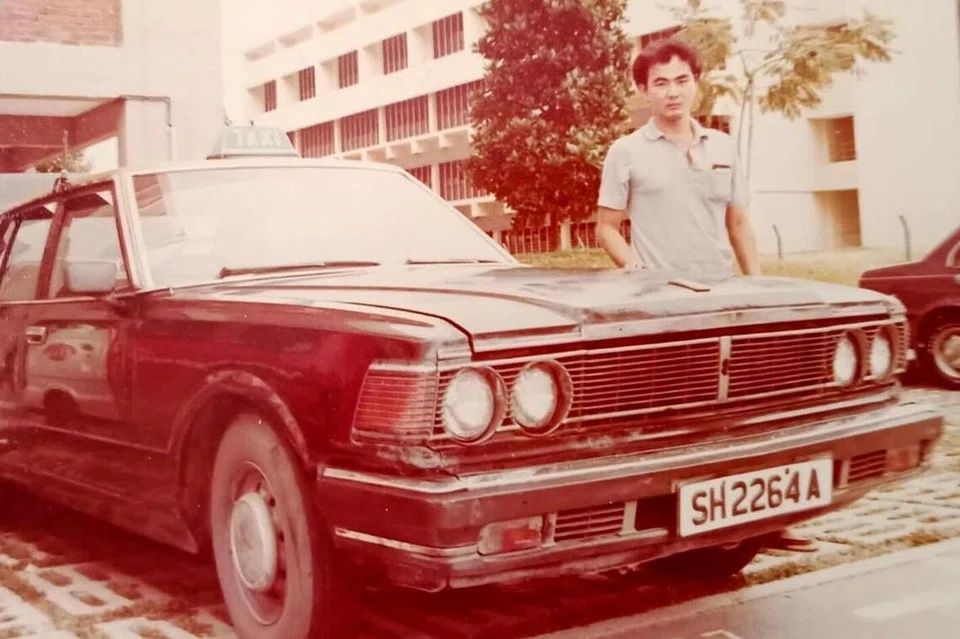 Cheng Siu Yong with his yellow-top taxi in the 1980s. - Photo courtesy of CHENG SIU YONG