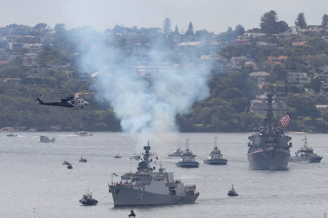 Vietnamese People’s Navy (VPN) Quang Trung, and the US Navy's USS Fitzgerald enter Sydney Harbour ahead of the Kakadu International Fleet Review, a biennial maritime exercise marking 125 years of the Australian Navy, in Sydney, Australia. Photo: REUTERS/Hollie Adams