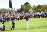 Golf-Emotional DeChambeau claims LIV Golf South Africa title after play-off