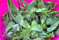 Rubber‑leaf tapai holds its own as festive treat