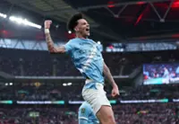 Soccer-Man City win League Cup final against Arsenal with O'Reilly double