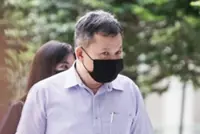 Assistant manager in Singapore charged with accepting bribes of at least S$230,000 cash and gifts over 10 years