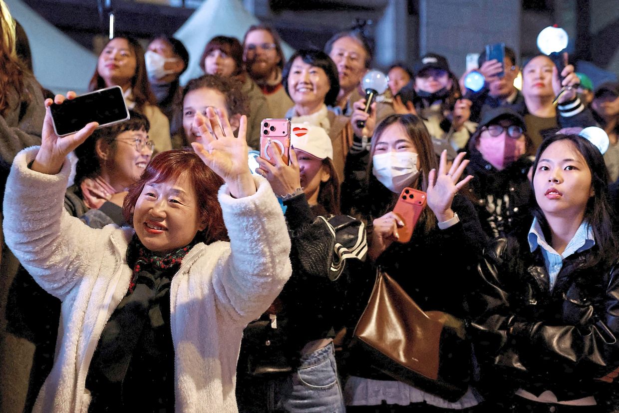 4. BTS fans, known as ARMY, of all ages and nationalities flocked Seoul to catch the concert. — Reuters