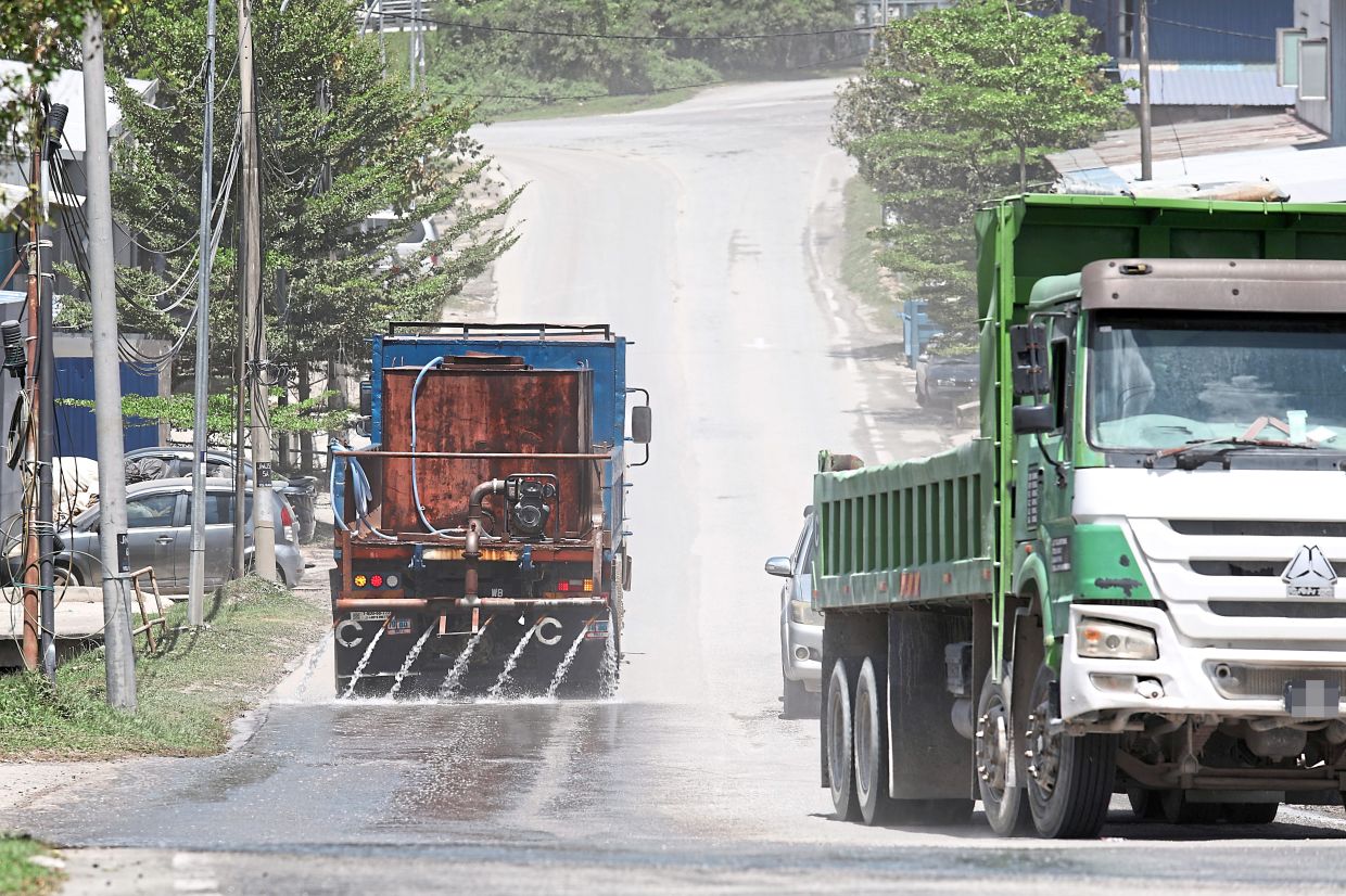 Water trucks being deployed for dust mitigation purposes in the surrounding roads.