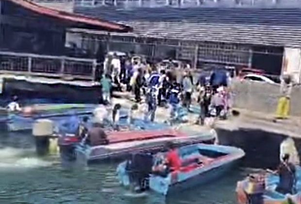 Pulau Gaya islanders arriving at the Kota KInabalu Central Market jetty.