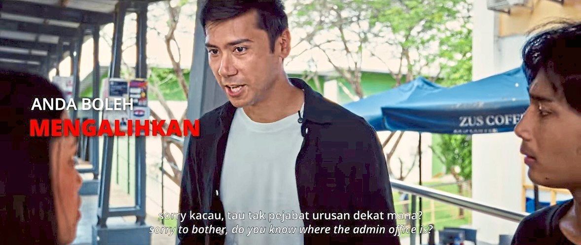 A still from the video showing a bystander intervening indirectly (mengalihkan) by asking the woman for directions. Photo: Women’s Aid Organisation