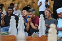 Dungun crash: Mother, two children laid to rest
