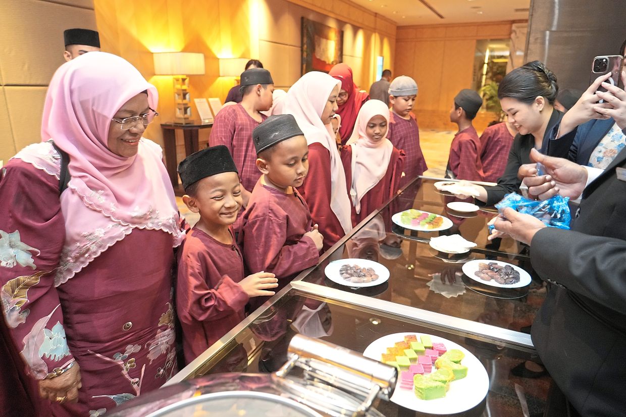 Guest from Persatuan Kebajikan Anak-Anak Yatim Hajah Kamariah preparing to break their fast at Cinnamon Coffee House, One World Hotel in Petaling Jaya. — Courtesy photos 
