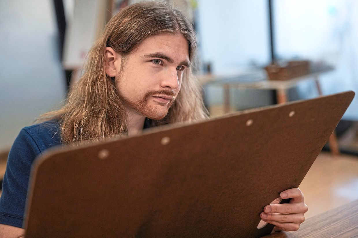 Mock interviews and practice sessions help Abrusia build confidence and communicate his skills.