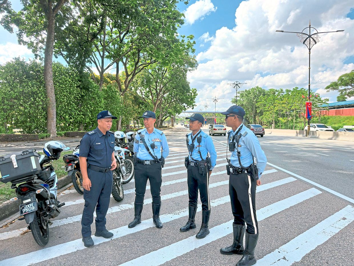 For ASP Mohd Fazree (left), the priority is keeping roads safe during the festive season.