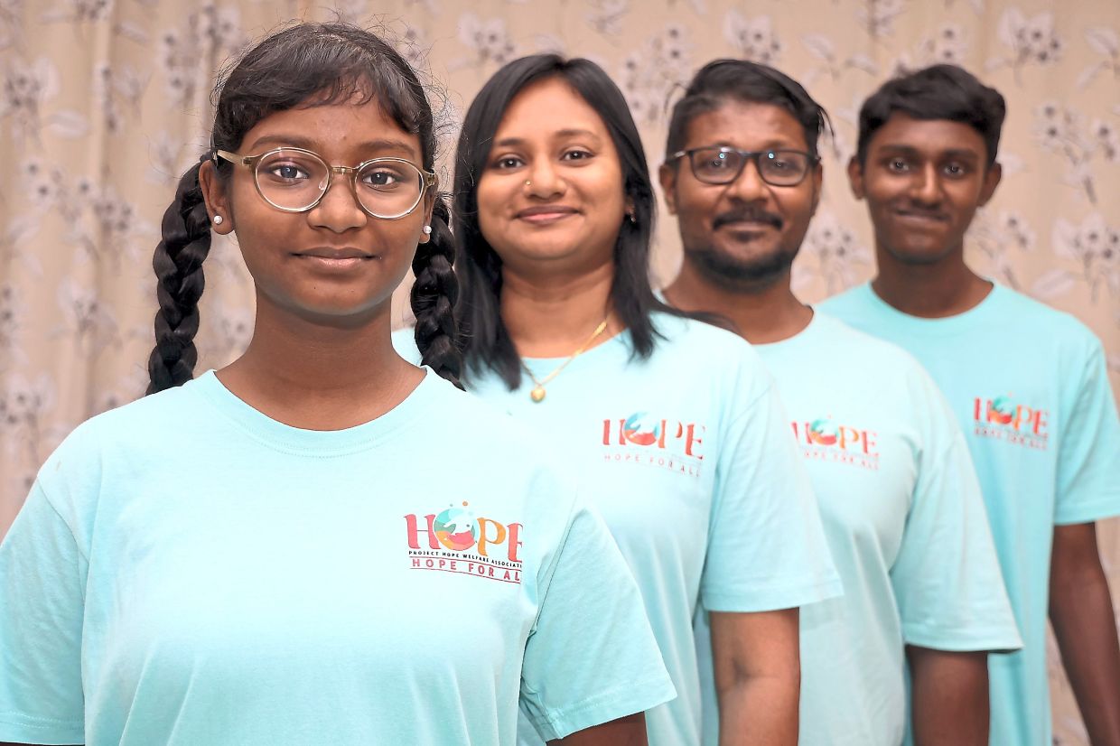 (From left) Krisandrah, Debra Sarah, Kris and Zachary are volunteers with the Project Hope Welfare Association.Photo: The Star/Muhamad Shahril Rosli