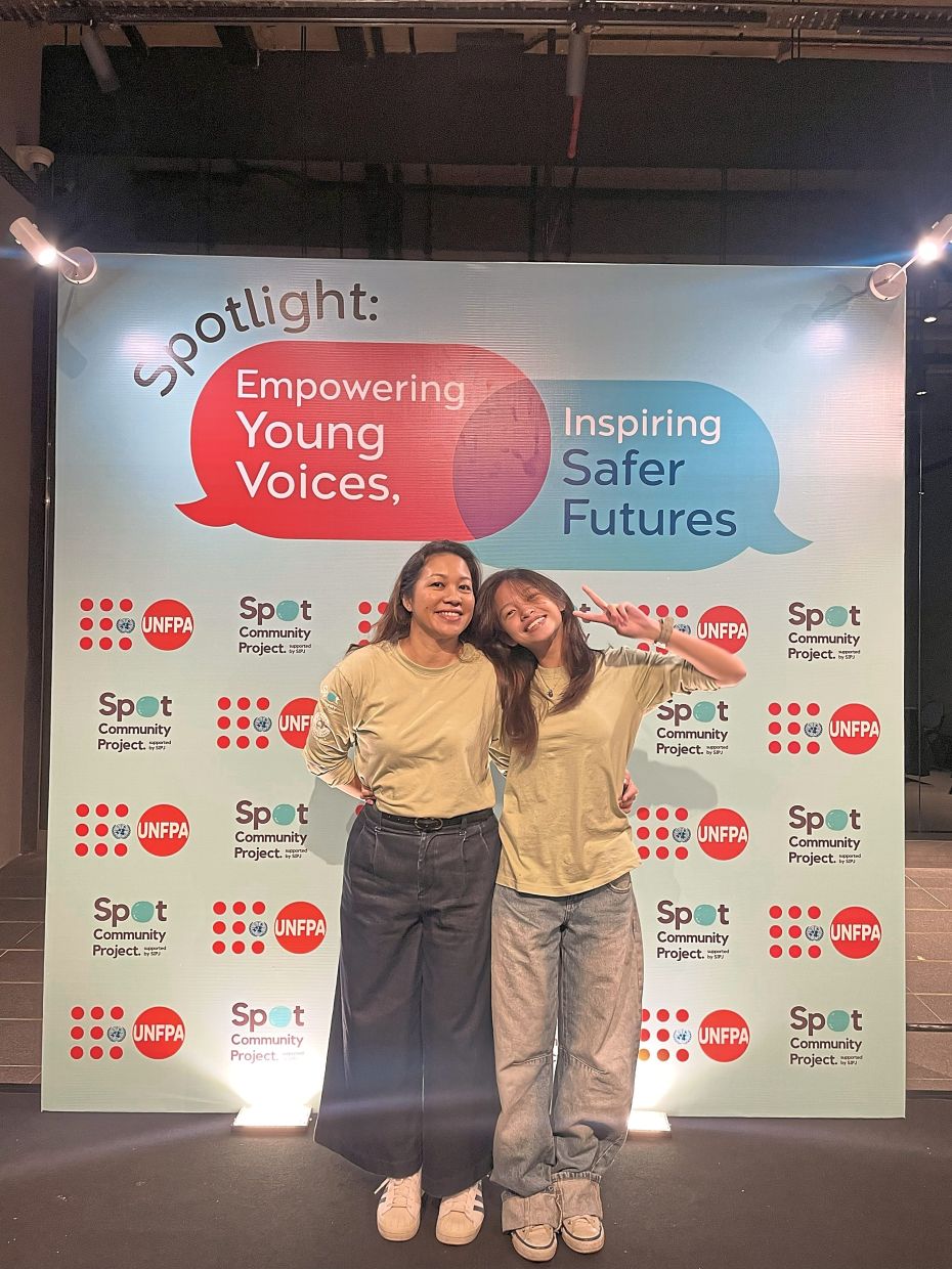 Eena (left) and her daughter Malaika at a Spot Community Project event. Malaika currently helps conduct workshops for younger students. Photo: Eena Houzyama