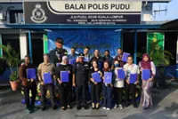 Outgoing Wangsa Maju OCPD presents appreciation certs to officers, journos