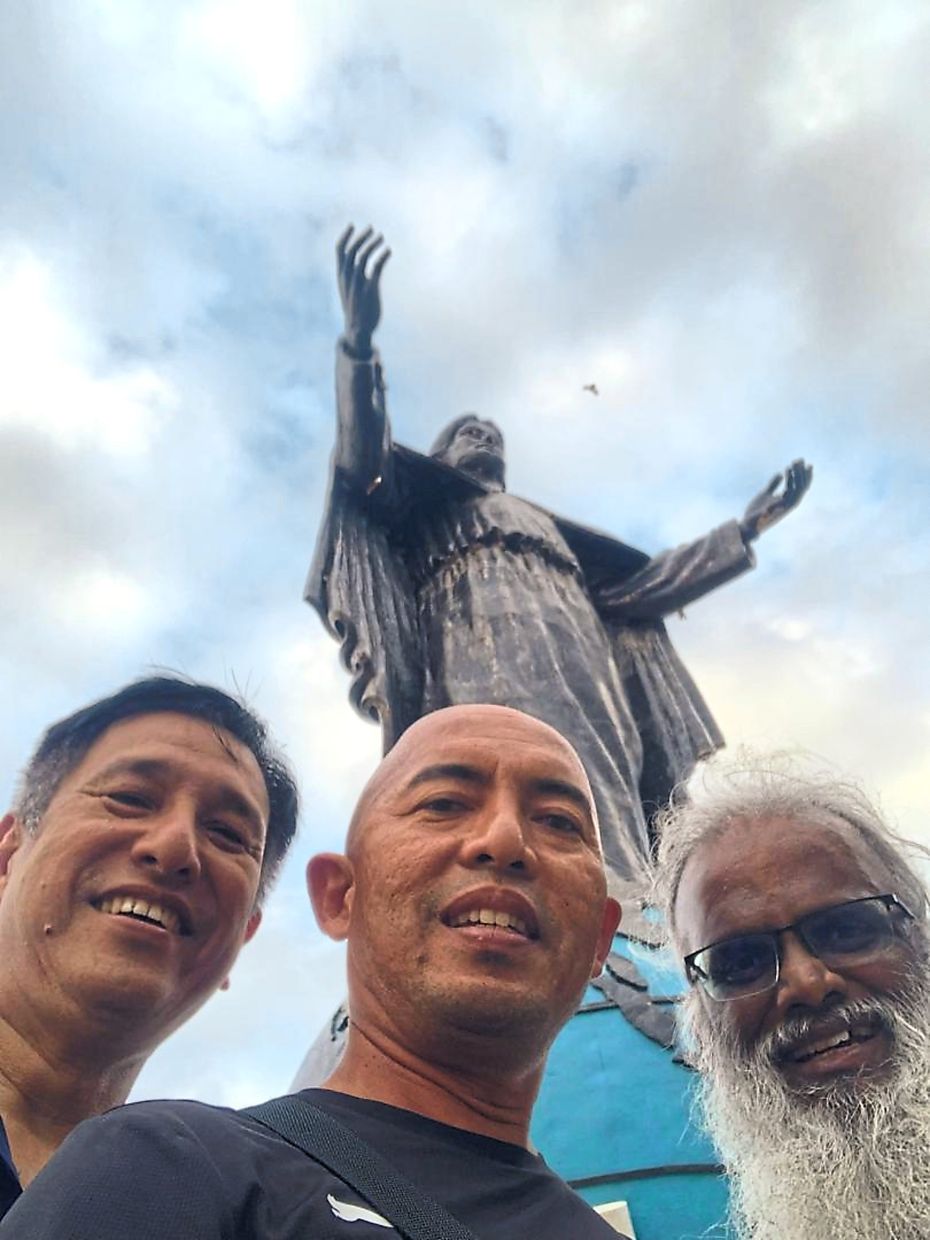(From left) Dr Danny, Ben and the writer in Dili.