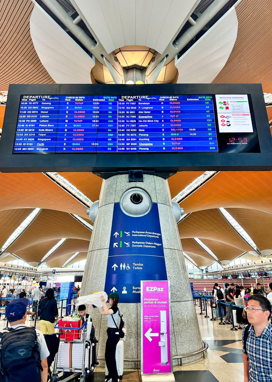 A scene atthe departure hallof Kuala LumpurInternationalAirport.