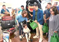 Warm festive welcome for arrivals at nine airports