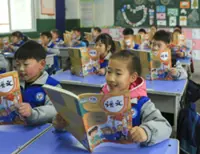 China announces policy to ease academic pressure on students