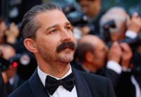 Half-naked Shia LaBeouf asks for a light in overseas hotel lobby