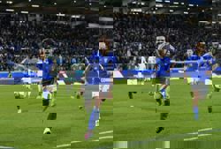 Soccer-Italy beat Northern Ireland 2-0 to close in on World Cup spot