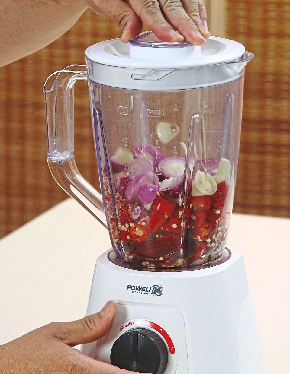 At its core, it is a sambal tumis, with spice paste ingredients blended before being sauteed until fragrant, and egg as an additional element for a bit of character.