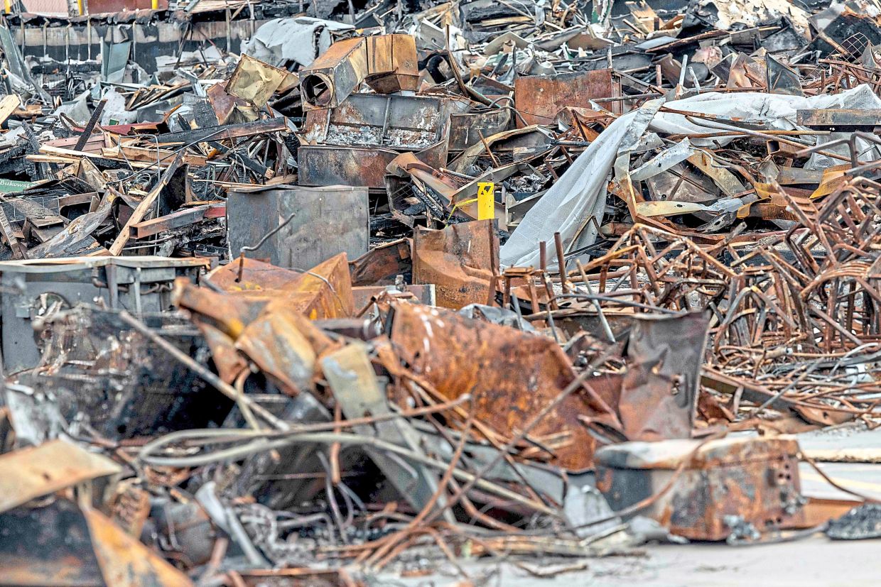 Debris from a shop that burned in 2025 in Nederland. — Nina Riggio/The New York Times