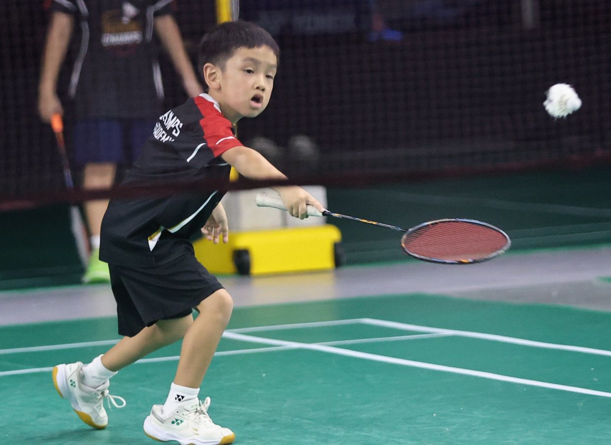 One of the juniors hard at work.-AZMAN GHANI/The Star