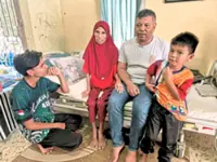 Partially blind widower holds on after heartbreak