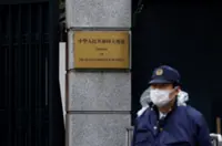Tokyo police search military base over Chinese embassy intrusion case