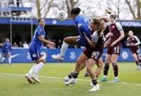 Soccer-Chelsea squeeze past Villa to keep faint WSL title hopes alive