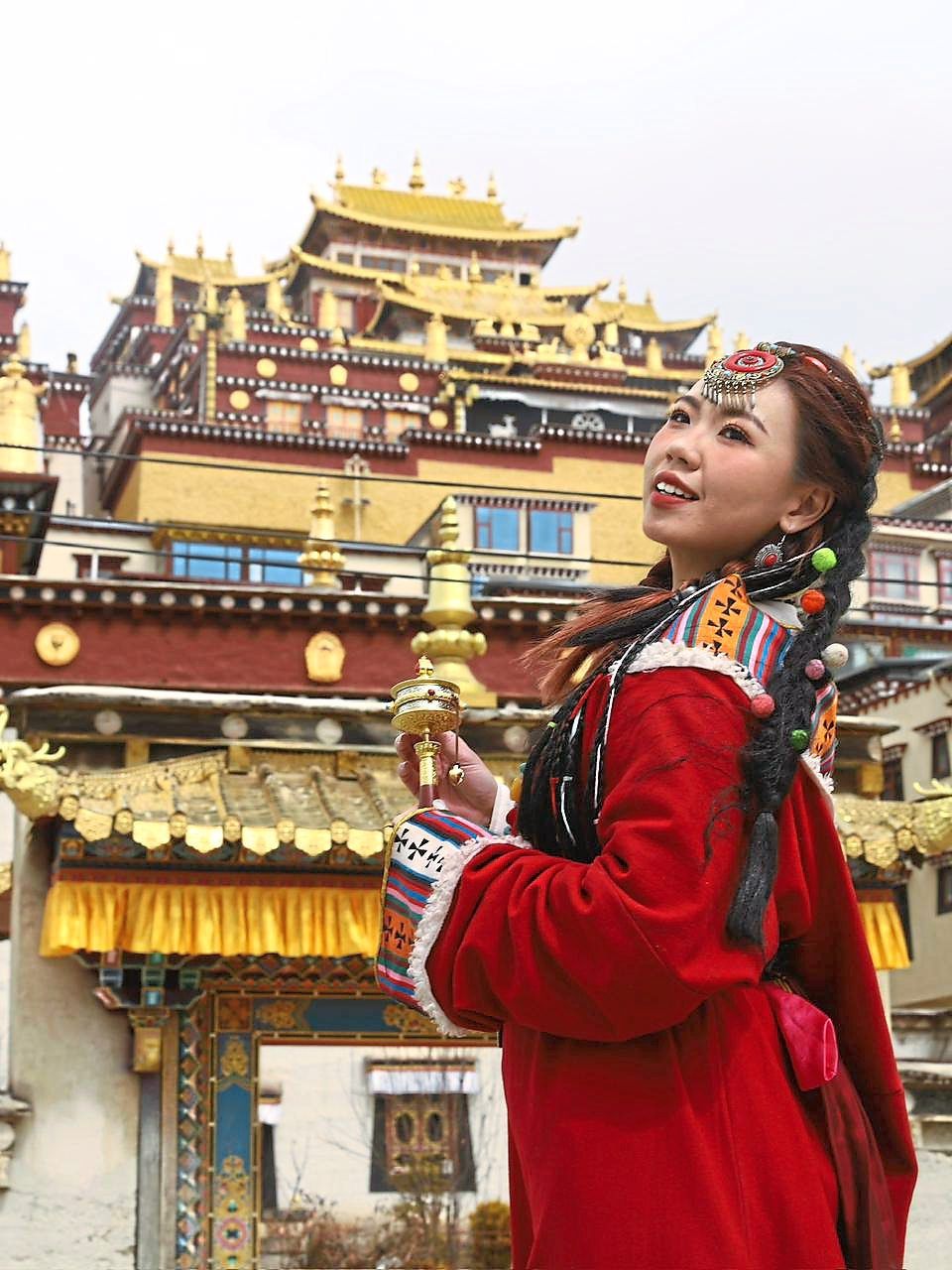 Trying on chupa is a way to learn about the Tibetan heritage in Shangri-La, China. — CANNY CLAUDYA LIM