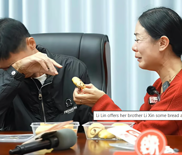 Li Lin offering her brother Li Xin some bread at their emotional reunion. - : mp.weixin.qq.com