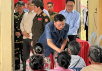 Lao President, PM visit Sikhottabong to provide support to storm victims