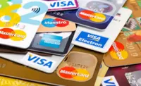 Australia to ban surcharges on payment cards, cut bank fees