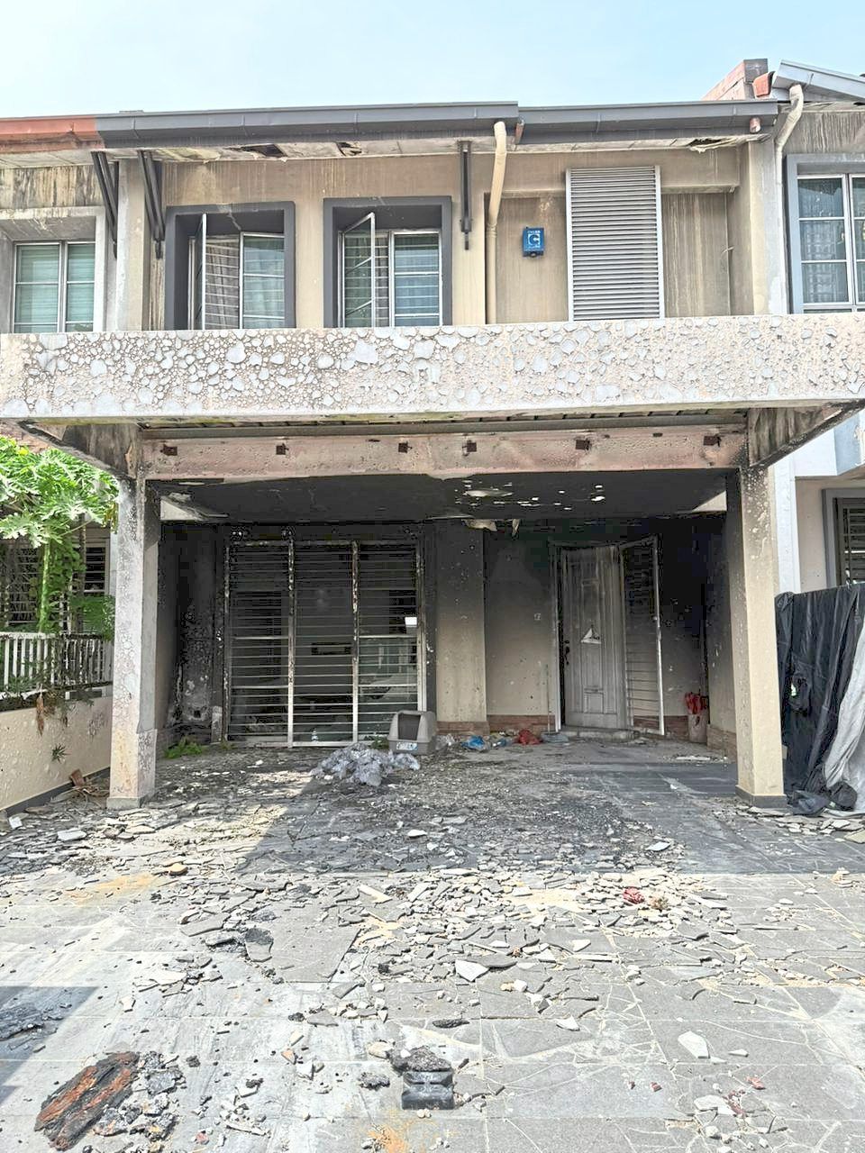 Blast aftermath: A dilapidated house damaged in last year’s Putra Heights inferno. The incident, which occurred on the second day of Hari Raya, sent towering flames into the sky and forced the emergency evacuation of nearby residents.