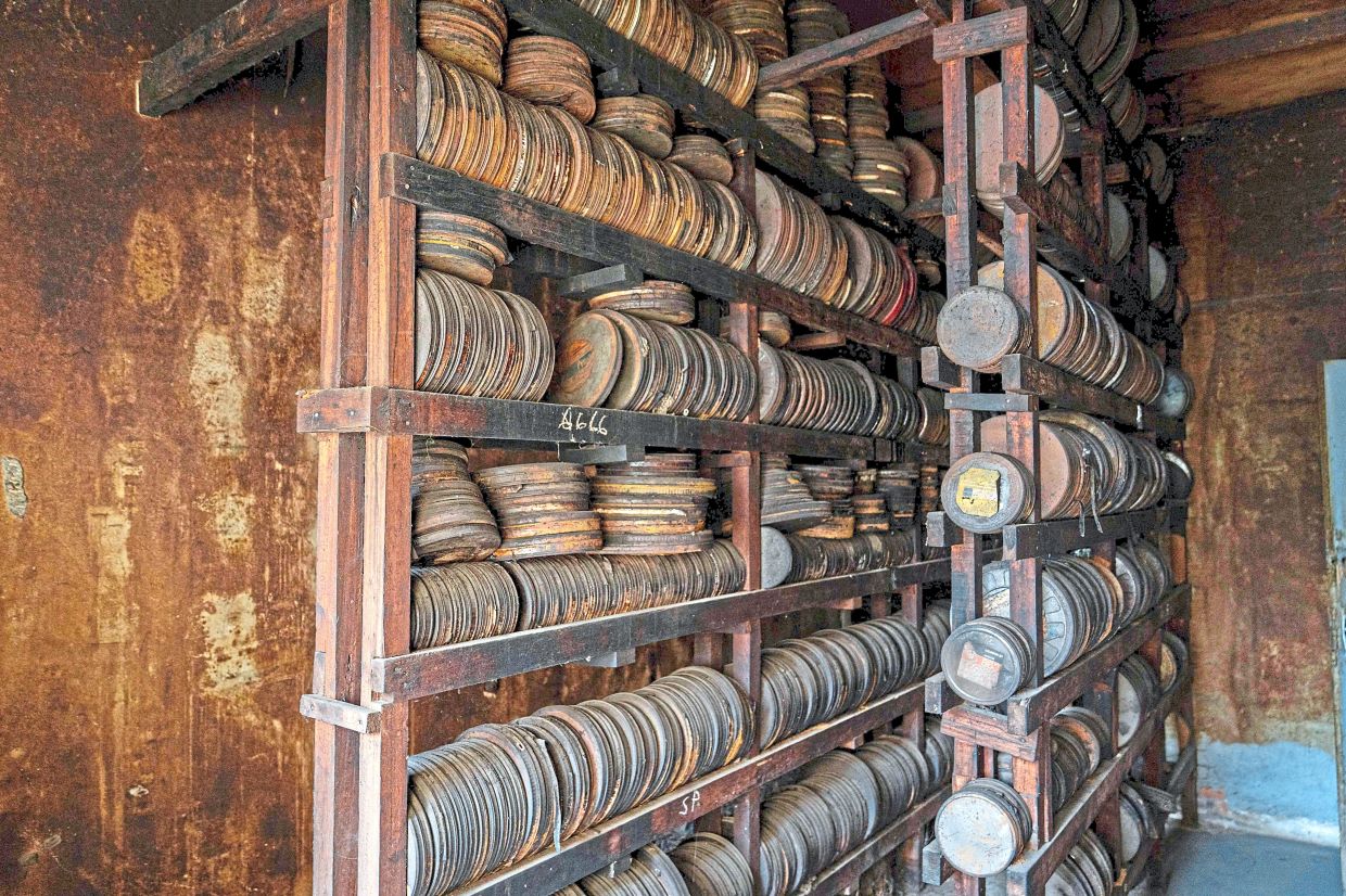 Reels (top) and cassettes (bottom) containing archive footage from the former Tele Congo are stacked up awaiting cleaning and digitisation at the former television head quarter in Brazzaville. — AFP