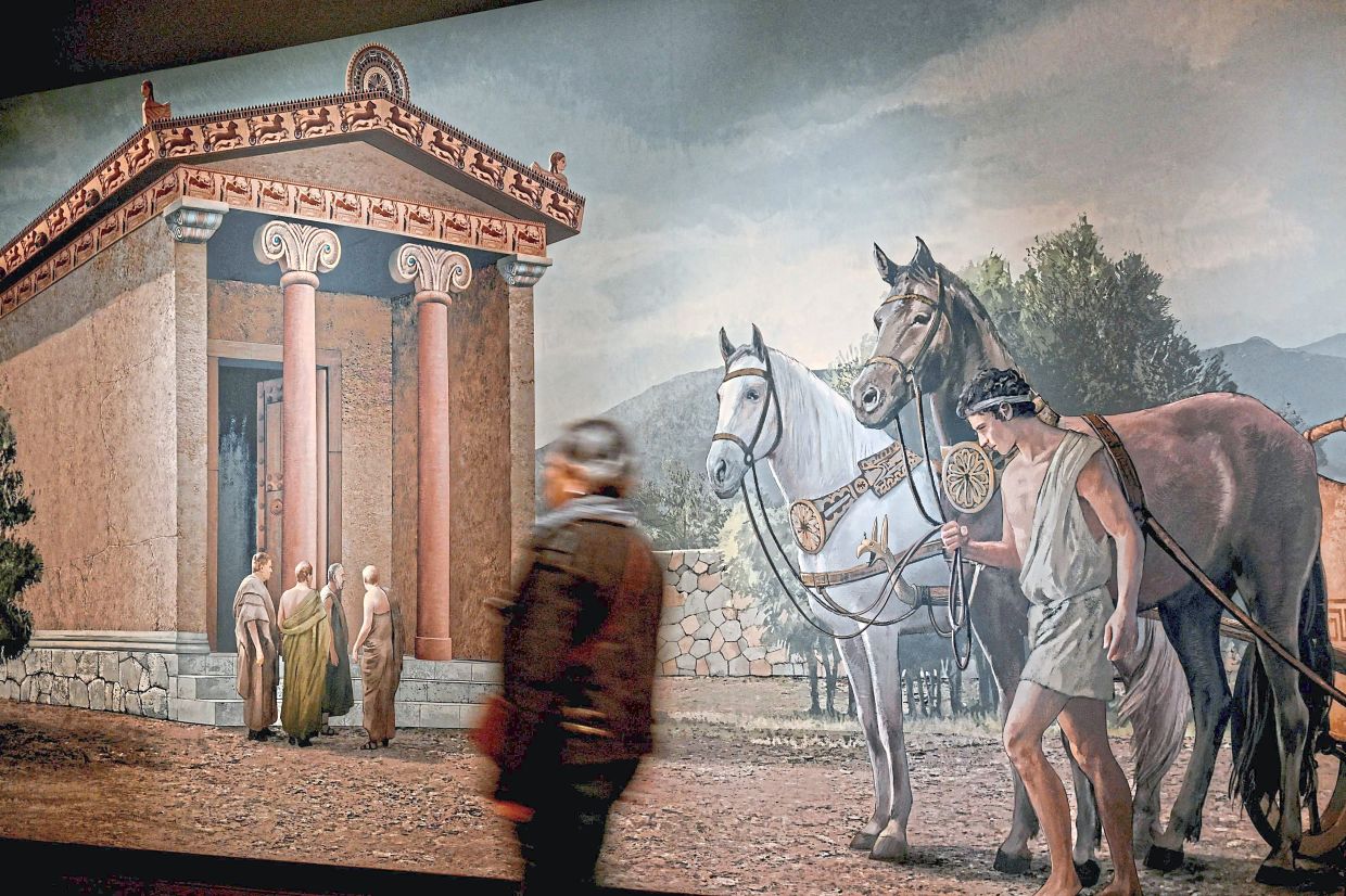 A visitor walks past a painting at Istanbul’s Archaeology Museum, as Turkiye intensifies efforts to identify and recover cultural assets of Turkish origin. Photo: AFP