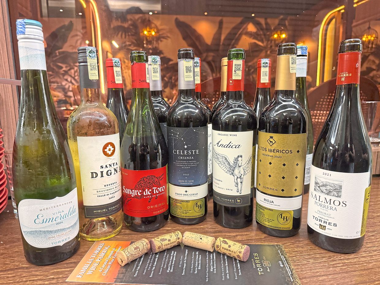 A selection of Familia Torres wines including Torres Vina Esmeralda Denomination of Origin Catalunya 2024 (left) and Torres Salmos Denominacio d’Origen Qualificada (right).