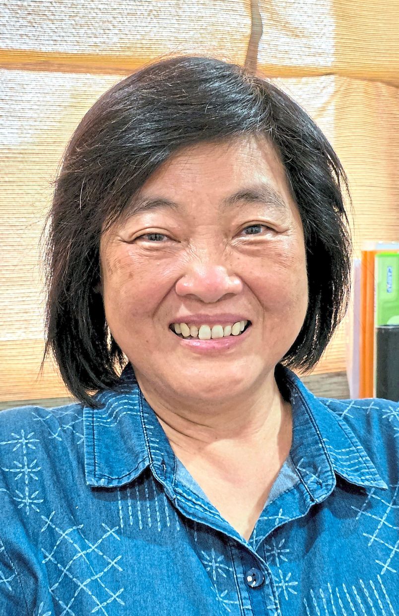 Hooi Leng wants to enjoy the outdoors while reading a book.