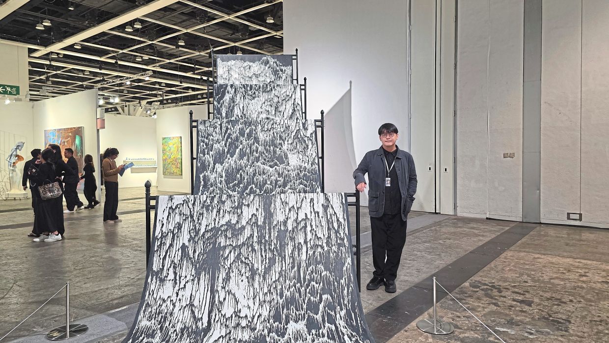 Malaysian artist Yeoh with his piece 'Streaming Mountain' (2018-2026), which was featured in the curated 'Encounters' section. – HANIS MAKETAB/The Star