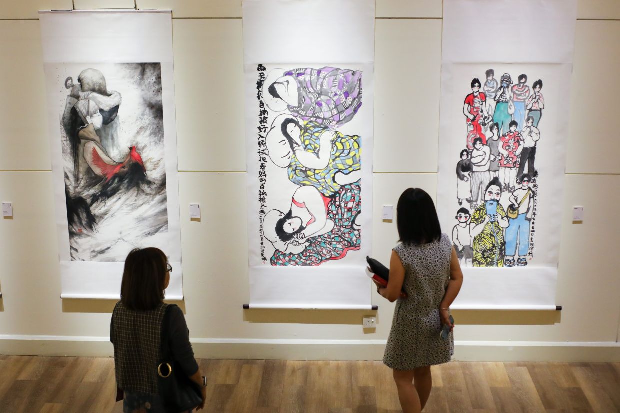 The 'Nanyang New Frontiers' exhibition at Wisma Kebudayaan SGM in KL spans three floors, showcasing ink painting, calligraphy and seal engraving. It commemorates the 20th anniversary of the Cao Tang Men Eastern Arts Society. Photo: The Star/Leong Wai Yee 