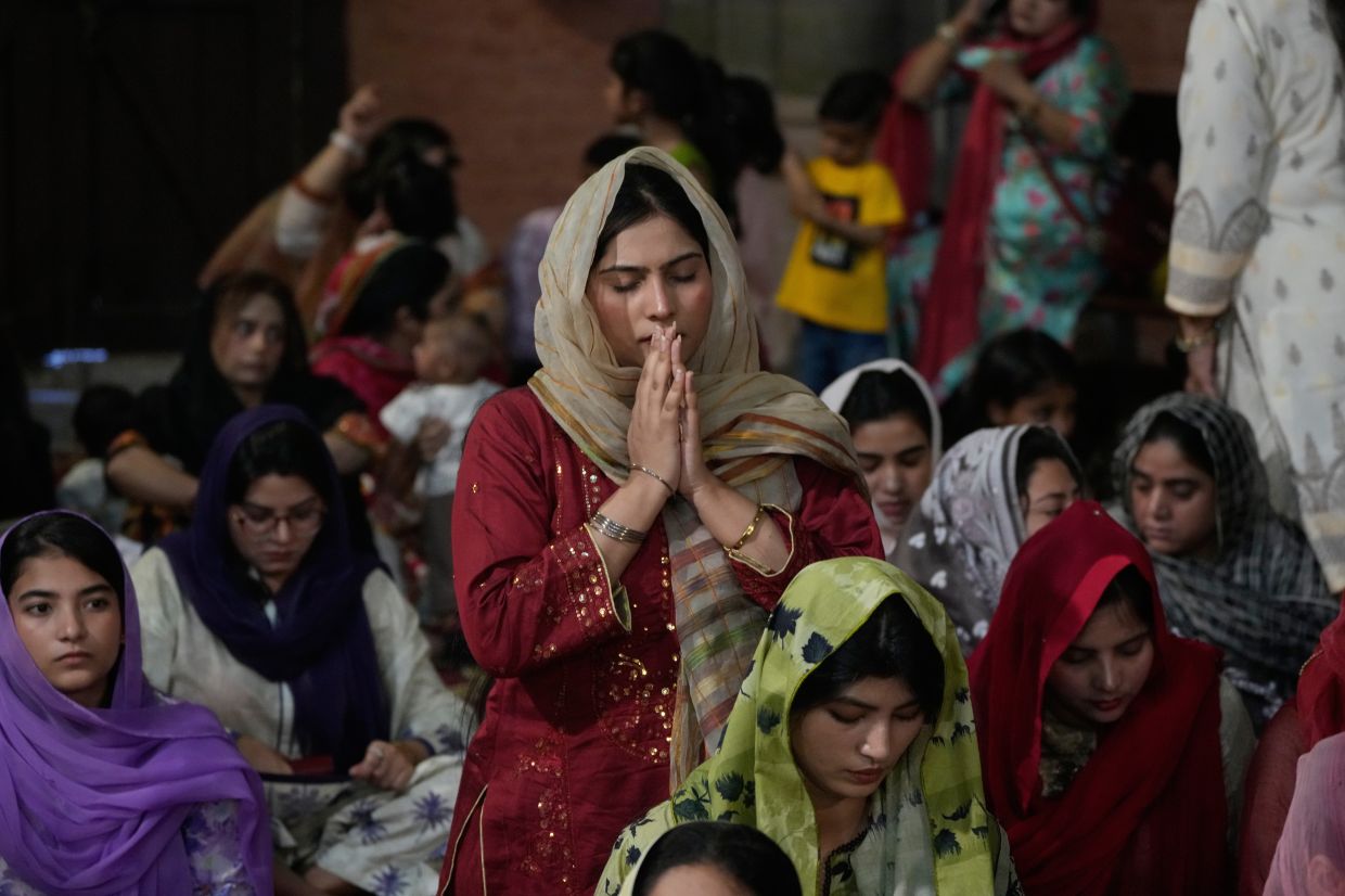 Christians attening Good Friday service at Sacred Heart Cathedral, in Lahore, Pakistan, on April 3, 2026. - AP