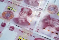 China drains cash from economy during oil shock