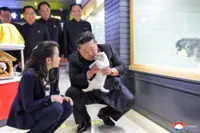 North Korea's Kim pets puppies, kittens at Pyongyang pet shop