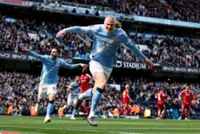 Soccer-Haaland bags hat-trick as Man City hammer Liverpool 4-0 in FA Cup quarter-final