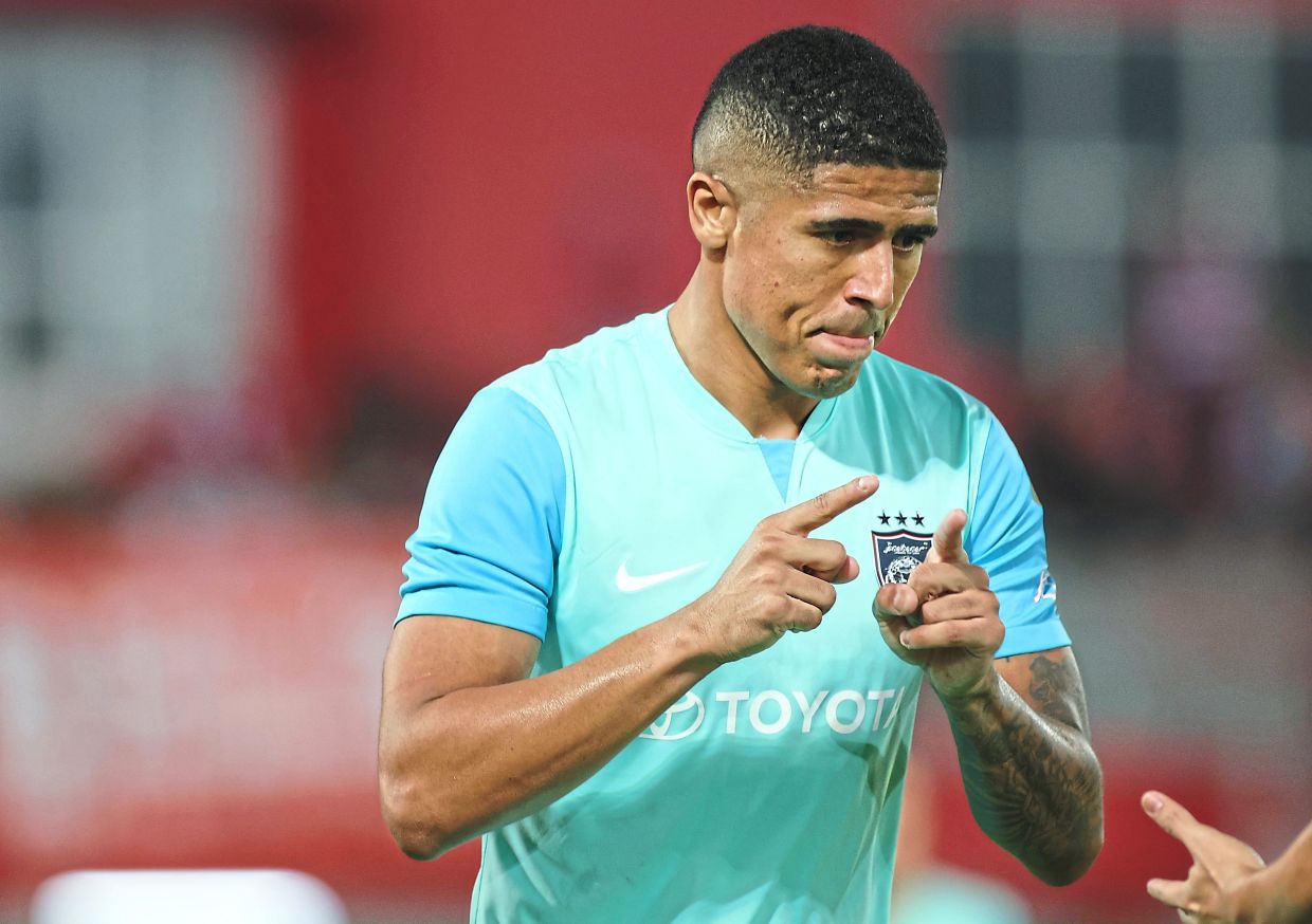 Good job: JDT’s Bergson Da Silva celebrates after scoring a goal.