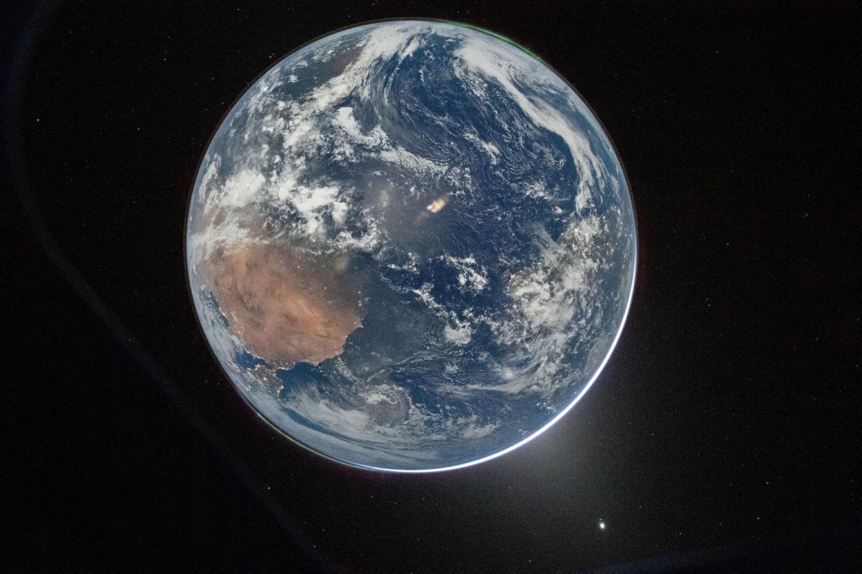 Views of Earth taken by Nasa astronaut and Artemis II Commander Reid Wiseman from one of the Orion spacecraft’s window after completing the translunar injection burn on April 2, 2026. — Nasa/Reuters