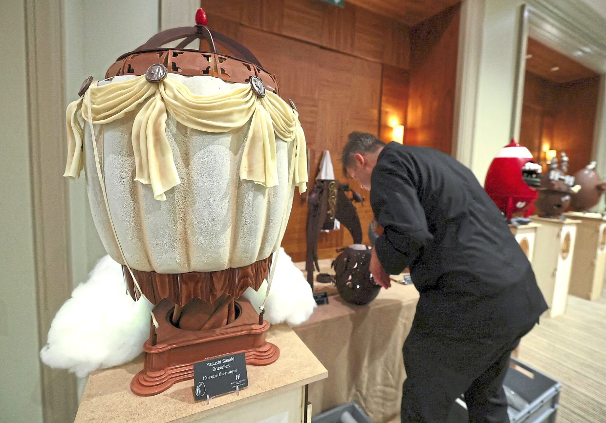 Giant chocolate eggs, featuring the theme ‘Pleasure in Motion’, displayed at the opening of the Bel’Oeuf event at Hotel Amigo ahead of Easter weekend in Brussels, Belgium. — Reuters