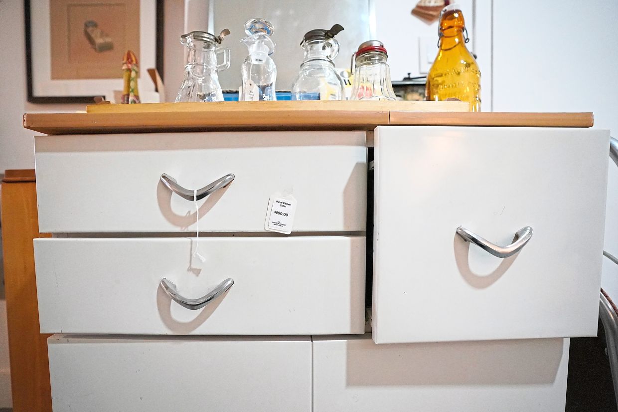 Furniture is for sale at Mothership, a vintage and thrift store, Thursday, March 26, 2026, in New York. (AP Photo/Alyssa Goodman)