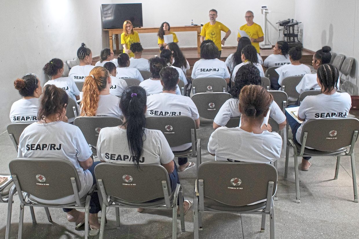 Prisoners take part in a reading programme under Federal University of Rio de Janeiro’s ‘Literature, Existence and Resistance’ project at the Djanira Dolores de Oliveira women’s prison.