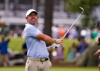 Golf-McIlroy arrives at Augusta unburdened as Scheffler leads Masters odds